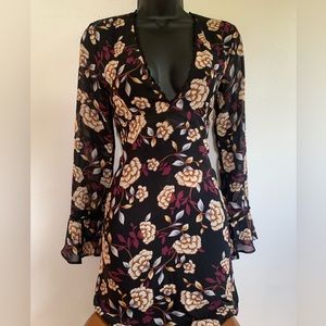 Long sleeve F21 dress with floral decal.